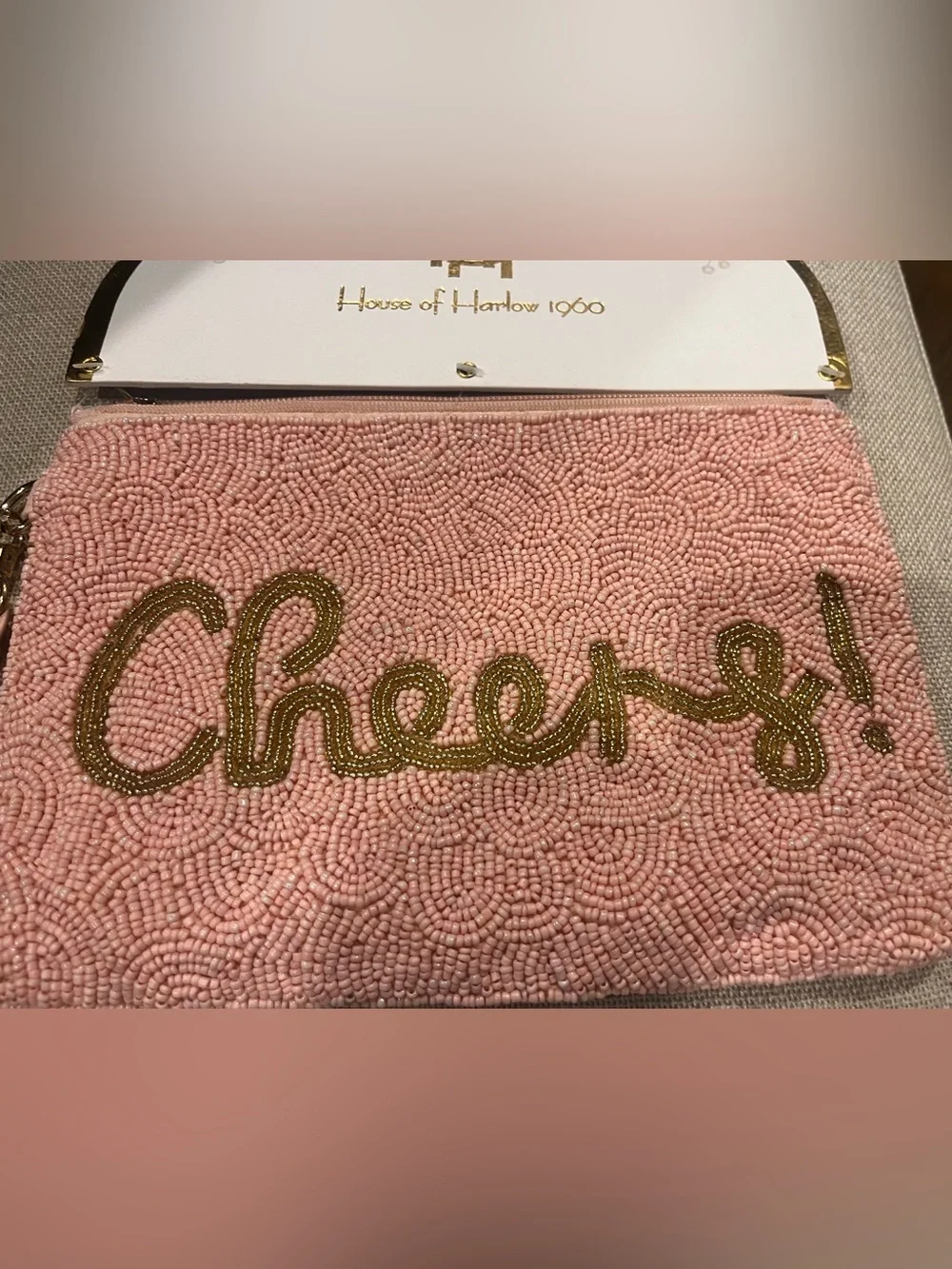 NWT House of Harlow 1960 Pink Beaded 'Cheers!' Wristlet Clutch with Gold Script